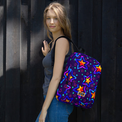 Woman with a colorful star-patterned backpack against a dark background