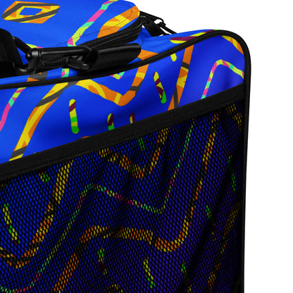 Colorful suitcase with a blue background