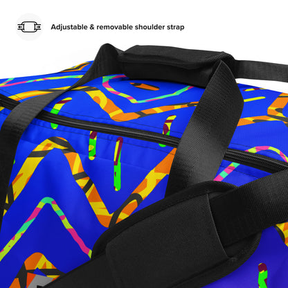 Colorful geometric-patterned duffel bag with an adjustable shoulder strap on a white background