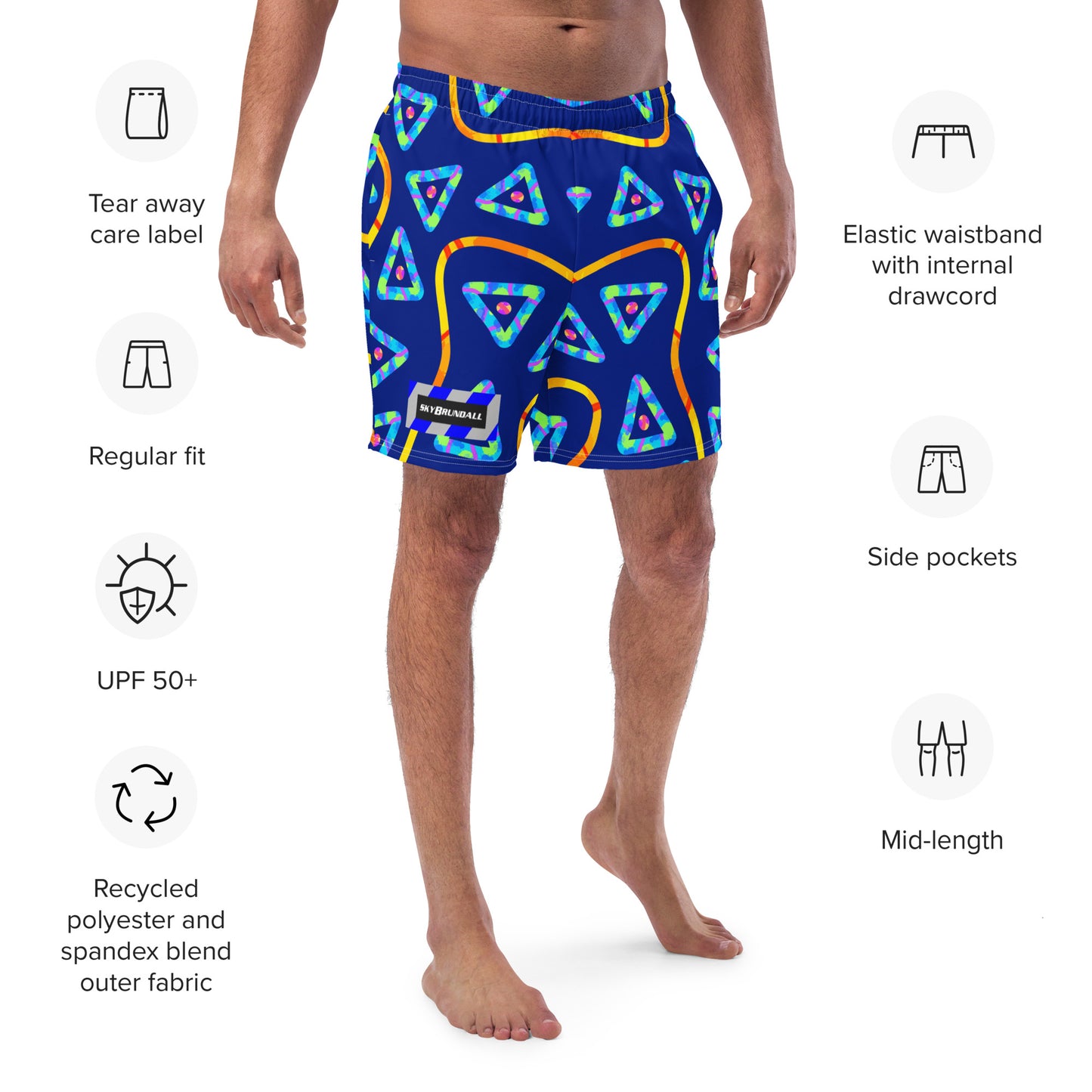 Blue swim shorts with colorful triangle pattern on a white background, featuring text labels about product features.