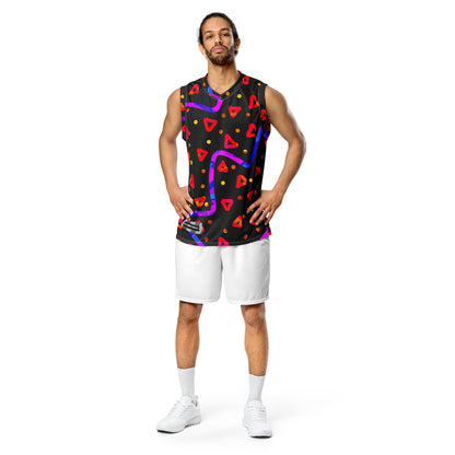 Man wearing a sleeveless shirt with colorful geometric patterns on a white background