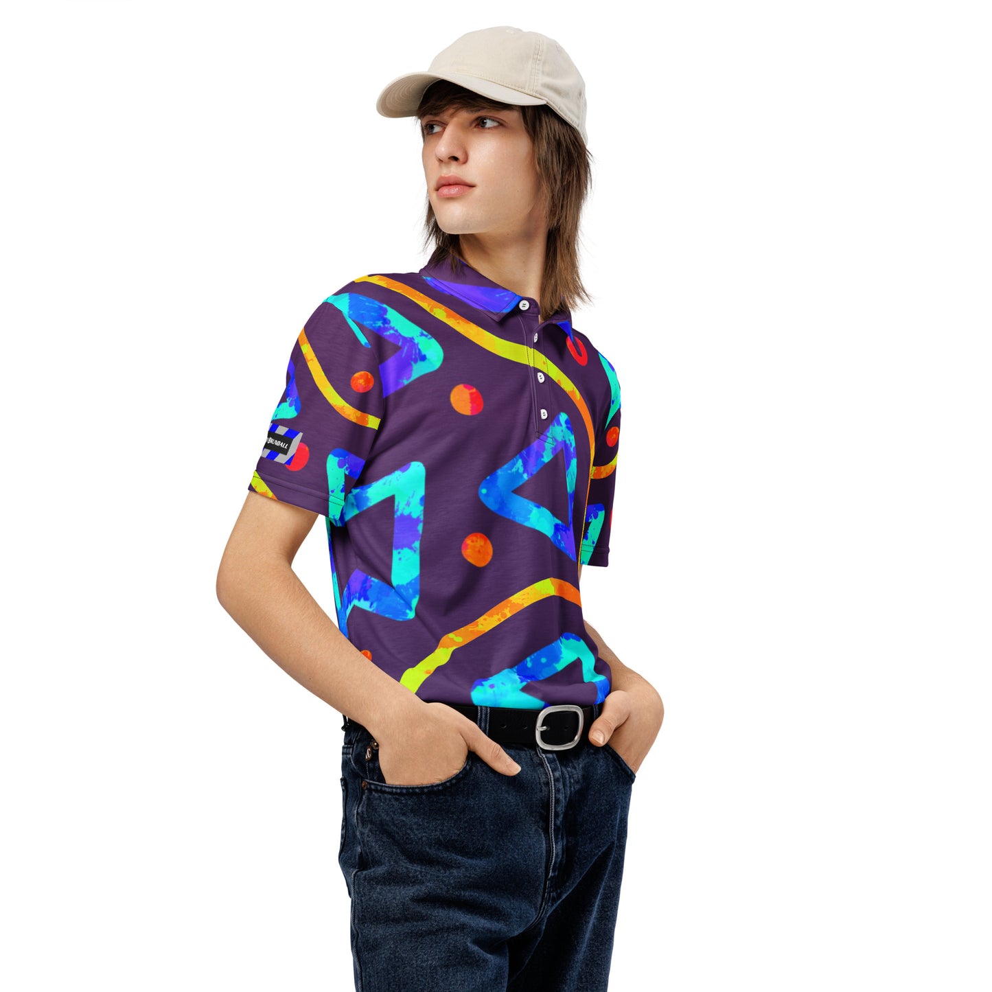 Person wearing a colorful geometric-patterned shirt on a white background